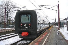 DSB IR4 2006 trainset photographed at the railwaystation in Middelfart 14. February 2005.  The IR4 was built by ABB Scandia in Denmark. Each unit consists of 3 coaches. Built in a number of 44 trainsets. The trainsets were put in service in 1989 - 1998. 4 electric engines of 420 kW per trainset. Max speed 180 km/h - 112 mph. Length 76 530 mm. Weight 133 metric tonnes. 24/16 seats 1st class, 183/183 + 20 seats 2nd class. Up to 5 trainsets can be put together.